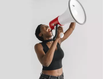 Girl speaking with a megaphone